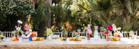 Table set with vibrant floral arrangements